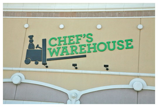 Image of Gemini Acrylic Logos installed on store front.